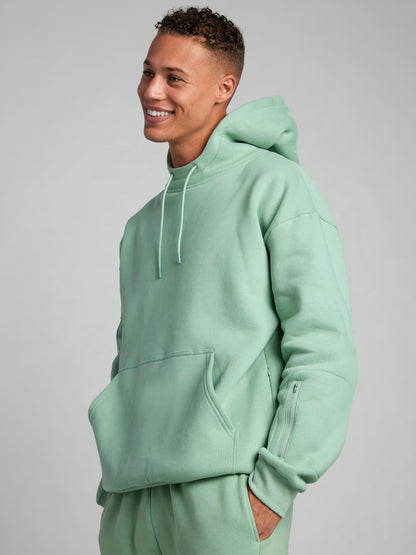 Rese-hoodie i flygplansläge