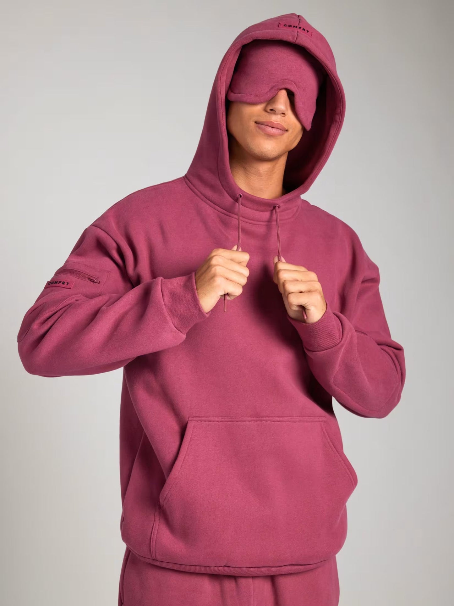 Rese-hoodie i flygplansläge