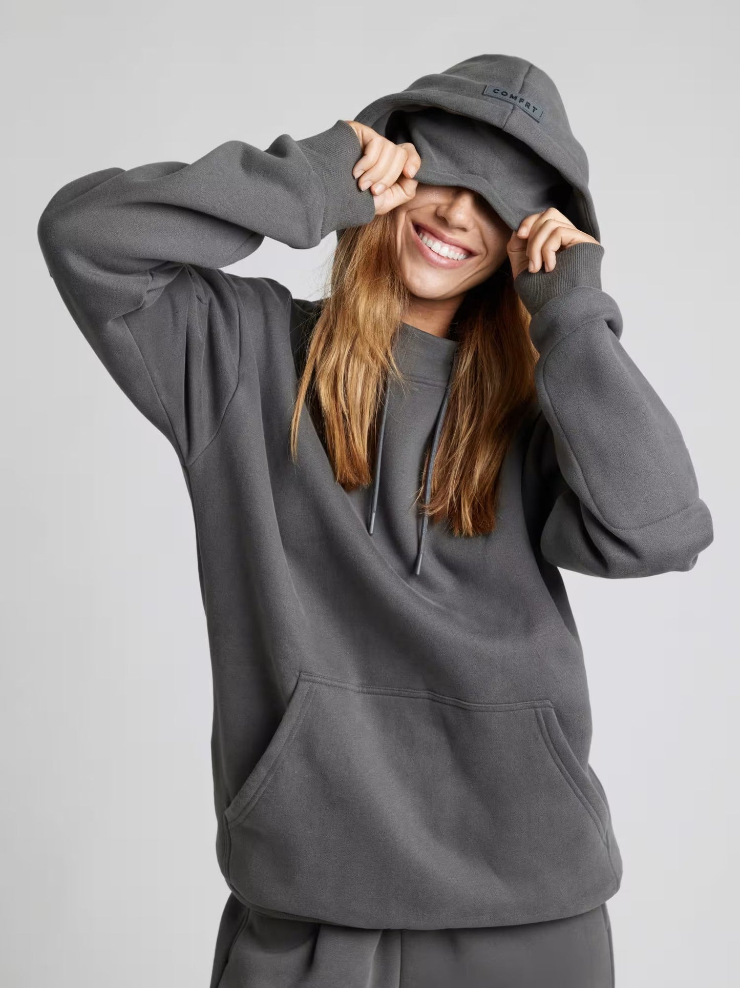 Rese-hoodie i flygplansläge