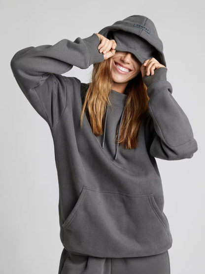 Rese-hoodie i flygplansläge