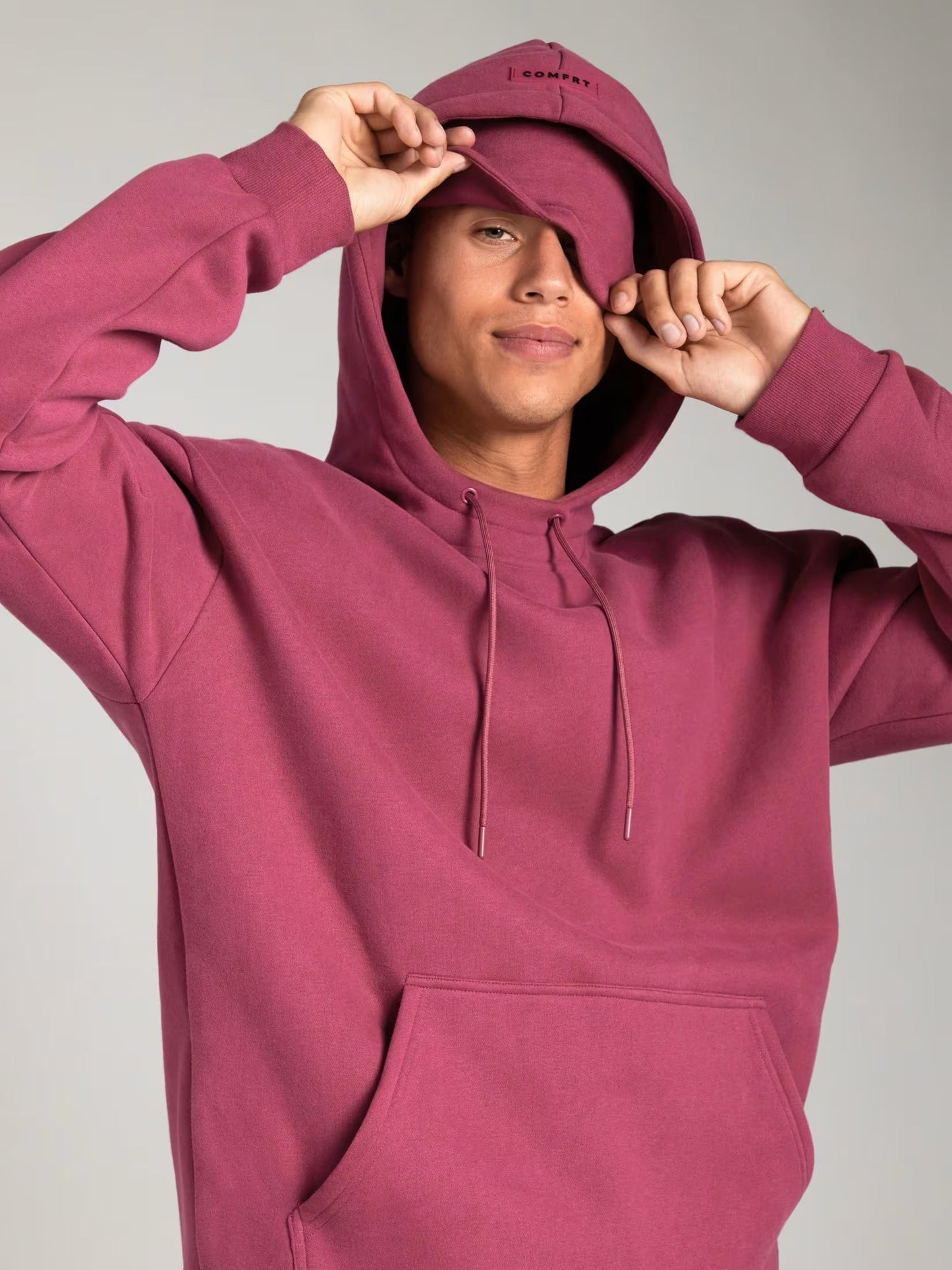 Rese-hoodie i flygplansläge