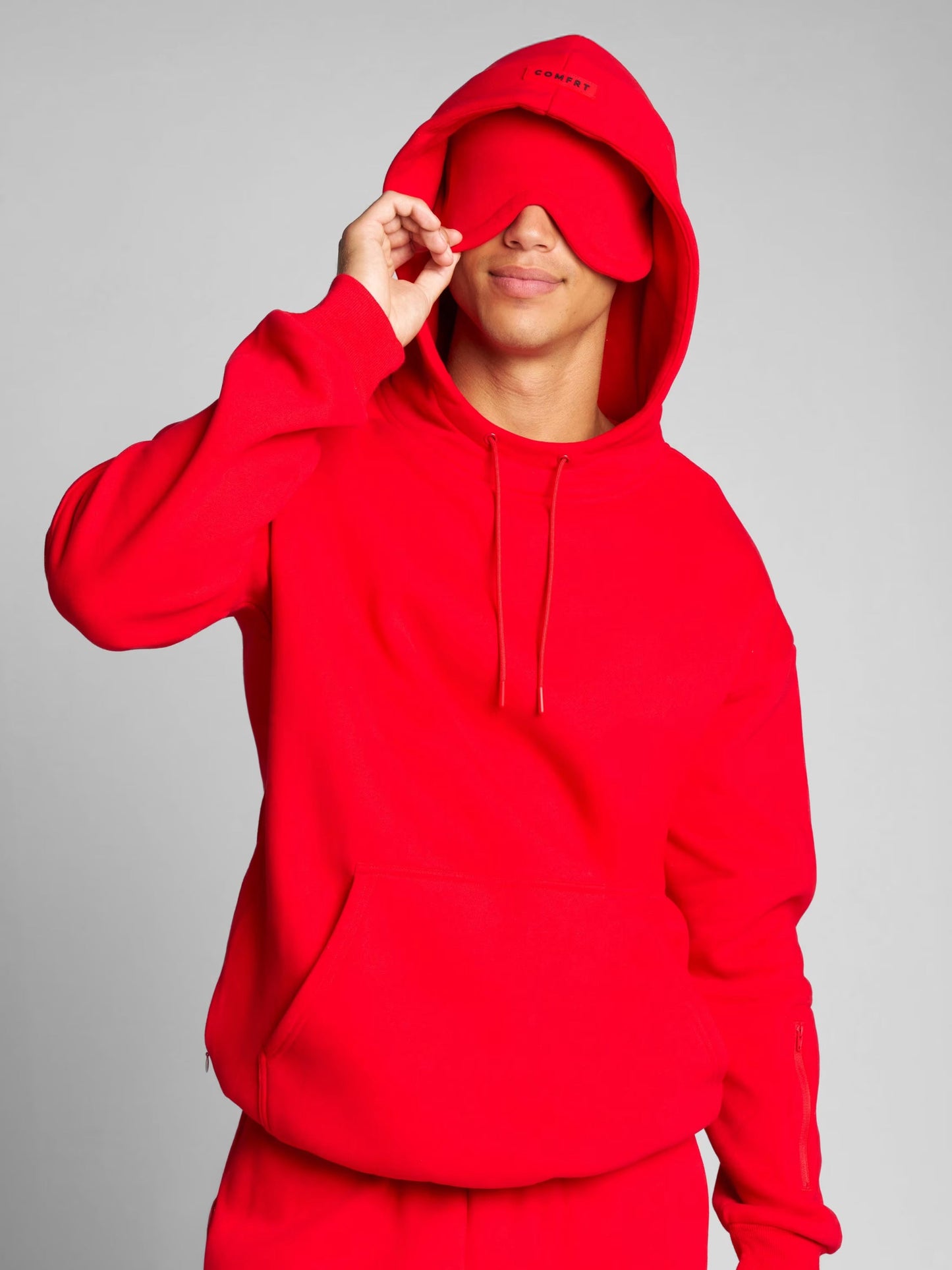 Rese-hoodie i flygplansläge