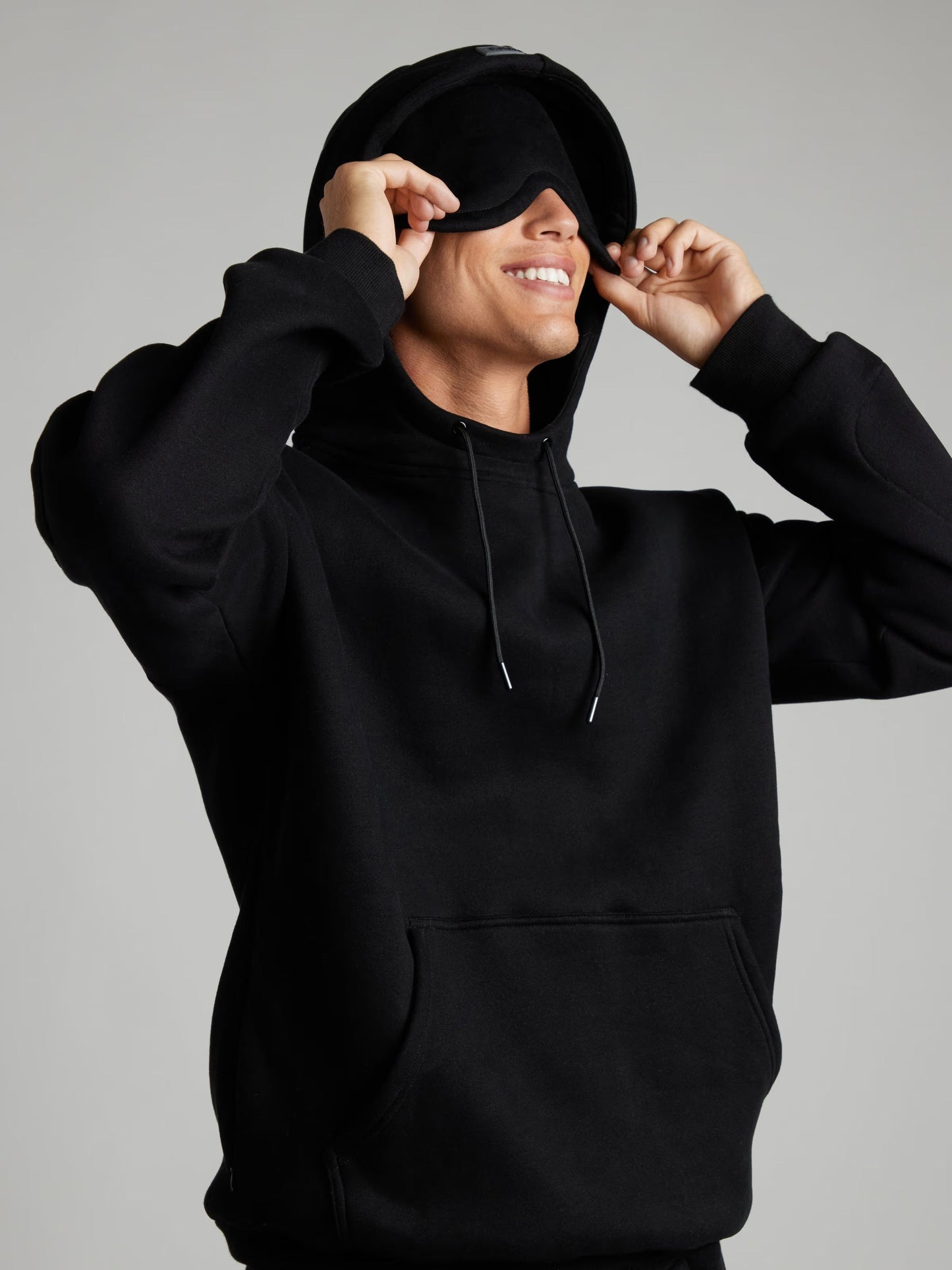 Rese-hoodie i flygplansläge