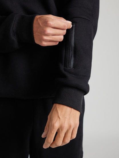 Rese-hoodie i flygplansläge