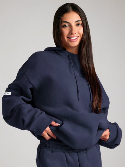 Rese-hoodie i flygplansläge
