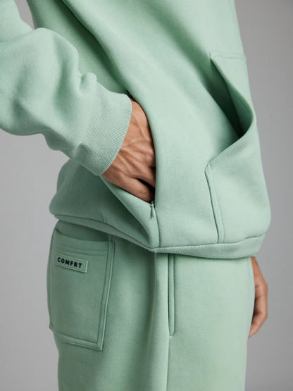 Rese-hoodie i flygplansläge