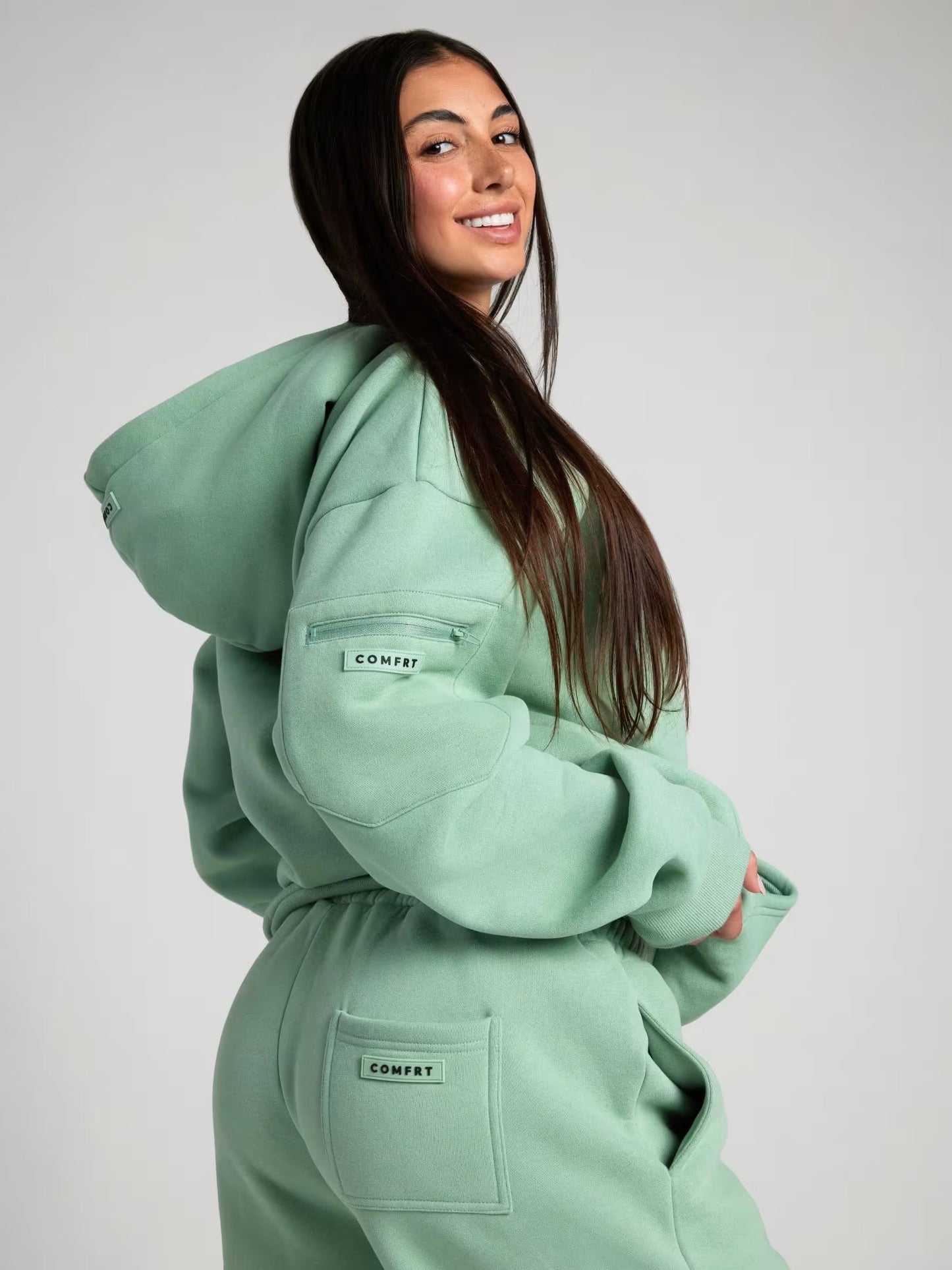 Rese-hoodie i flygplansläge