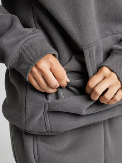 Rese-hoodie i flygplansläge