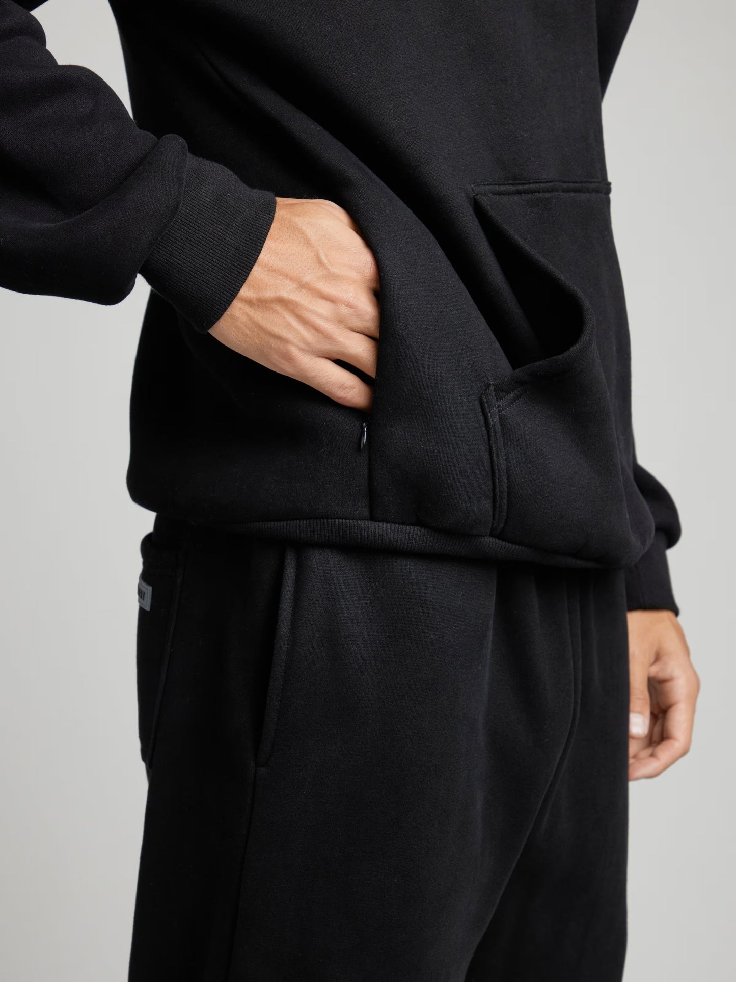 Rese-hoodie i flygplansläge