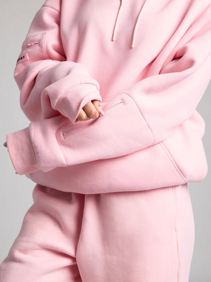 Rese-hoodie i flygplansläge