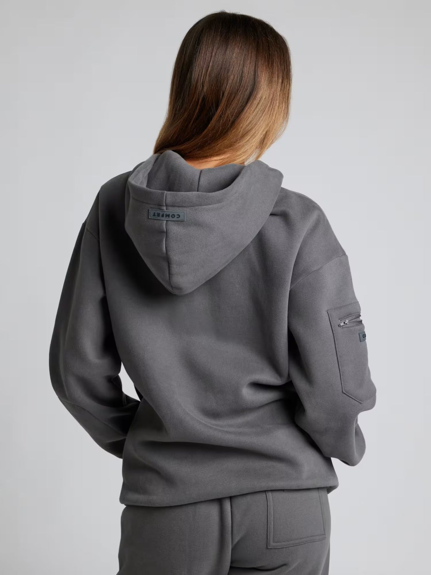 Rese-hoodie i flygplansläge