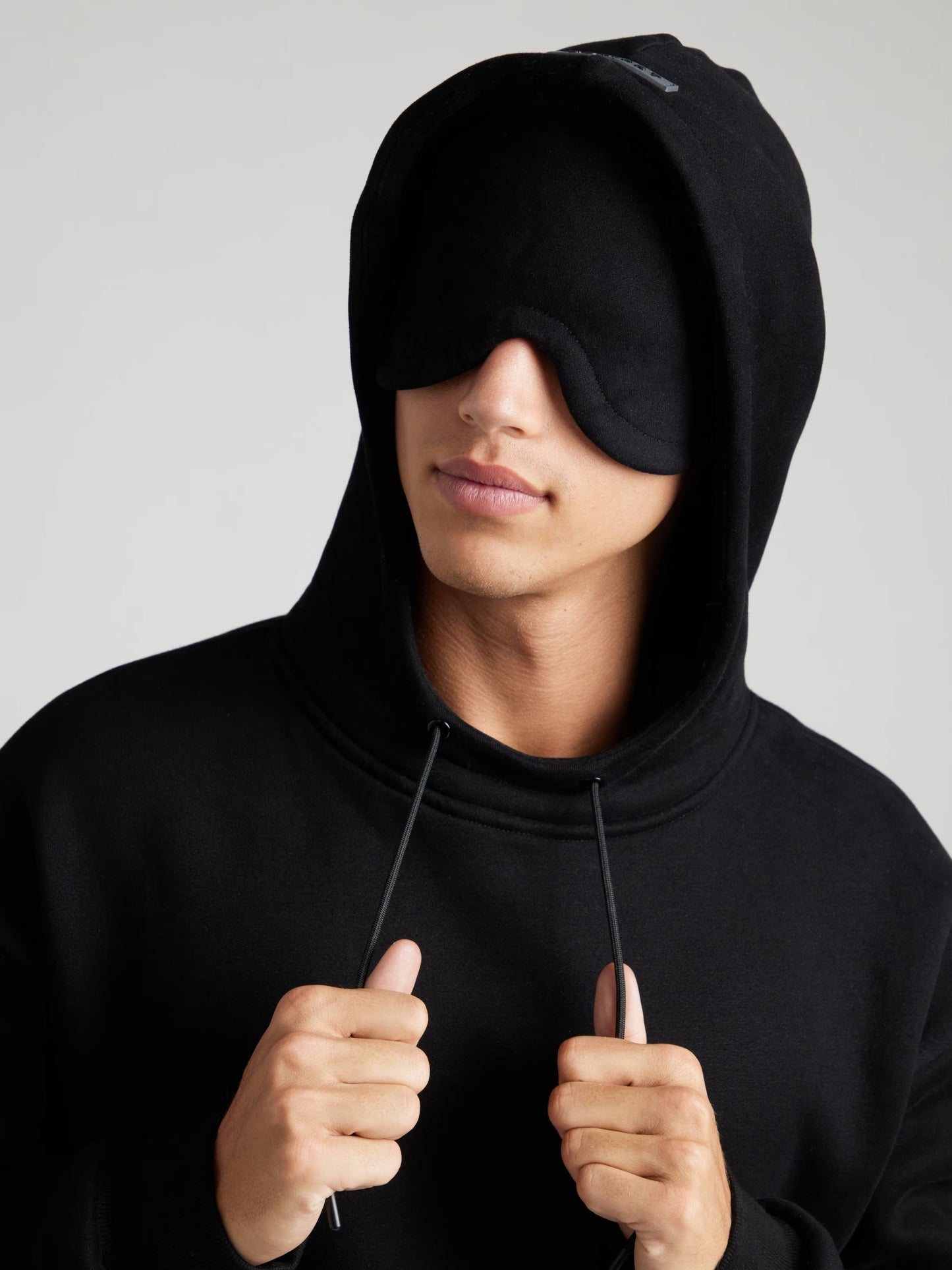 Rese-hoodie i flygplansläge