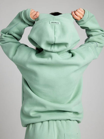 Rese-hoodie i flygplansläge