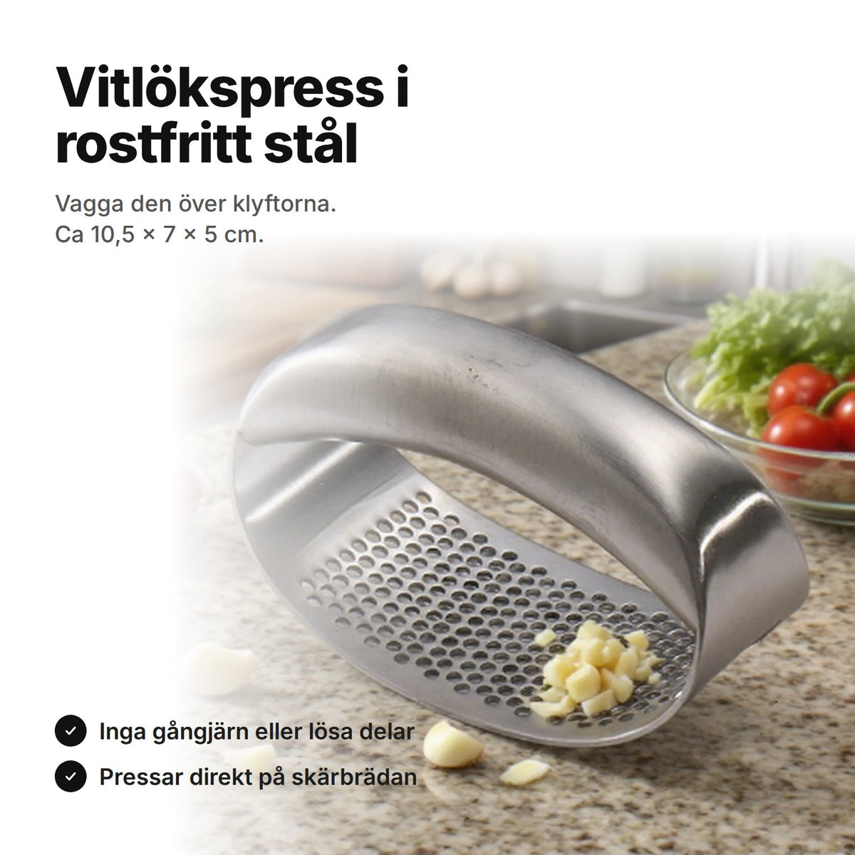 Vitlökspress i rostfritt stål på köksbänken – ca 10,5 × 7 × 5 cm, utan gångjärn eller lösa delar