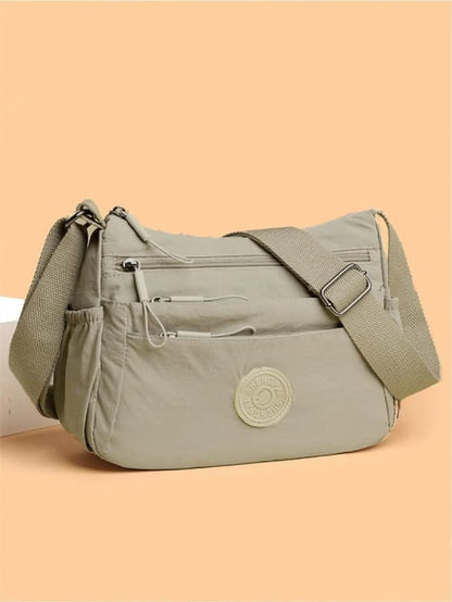 Nova Crossbody — Vardagsväska med fler fack