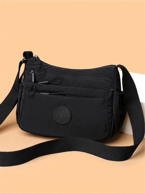 Nova Crossbody — Vardagsväska med fler fack